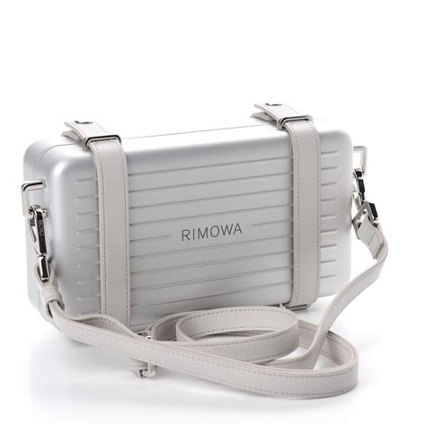 dior and rimowa clutch|christian dior silver clutch.